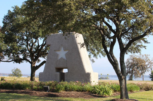 Atascocita Texas stone A monument with Texas star and Lake Houston — child custody attorney Houston TX serving Atascocita Humble ISD custody cases