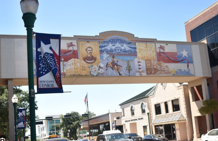 Downtown Conroe mural in Montgomery County, Texas &mdash; birthplace of the Texas Lone Star Flag and seat of the 418th District Court Montgomery County
