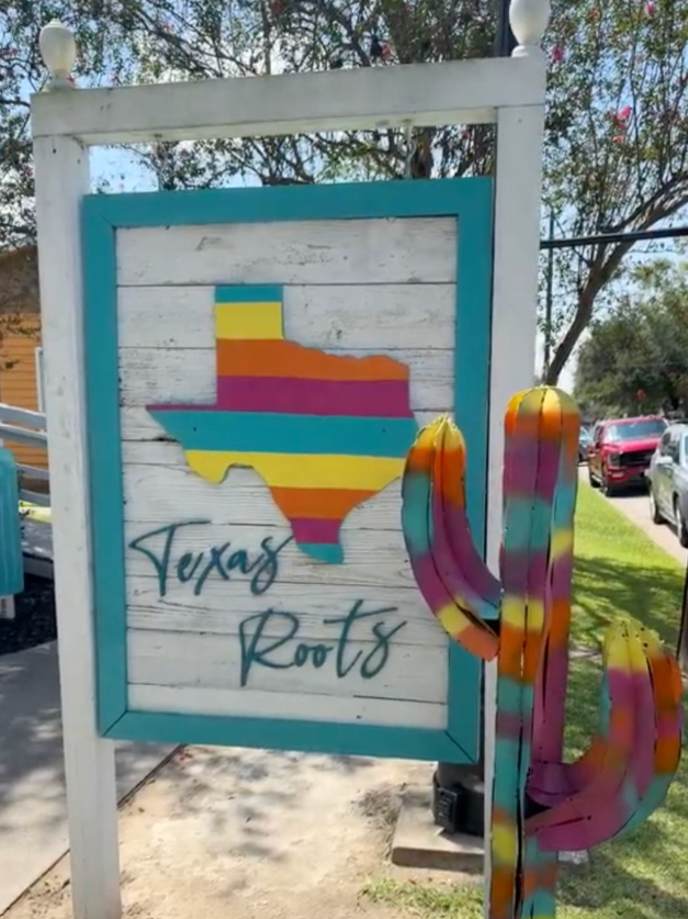 Texas Roots sign in Old Town Spring — family law attorneys serving Spring TX